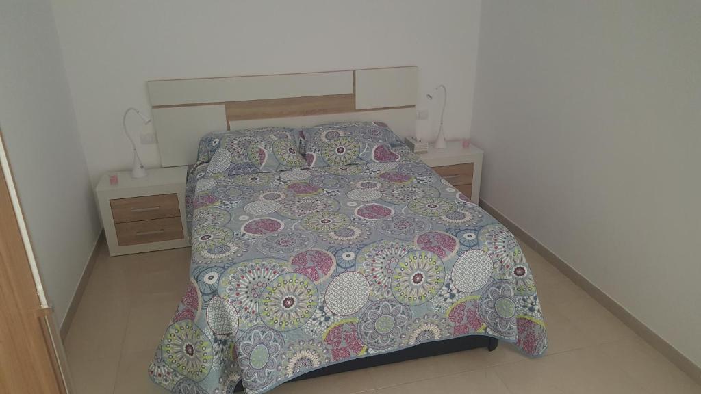 Postel nebo postele na pokoji v ubytování Apartamento Juli4