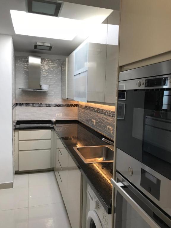 A kitchen or kitchenette at Villa Ola, Golf del Sur