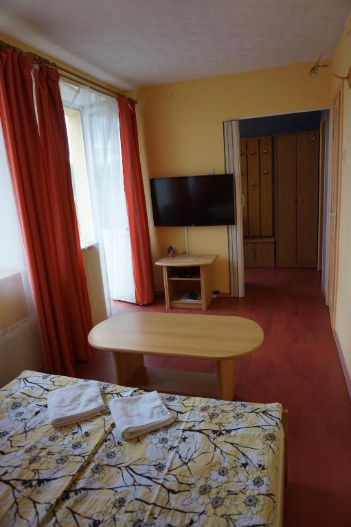 Postel nebo postele na pokoji v ubytování Guesthouse Bērzi