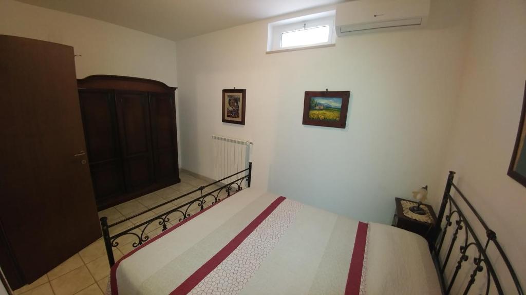 Postel nebo postele na pokoji v ubytování Villa Frantoio