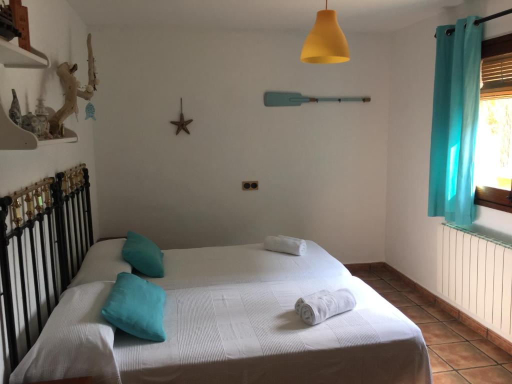 Postel nebo postele na pokoji v ubytování Can Cadiretes