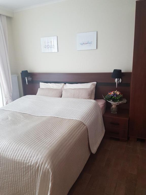 Postel nebo postele na pokoji v ubytování Willa Horyzont