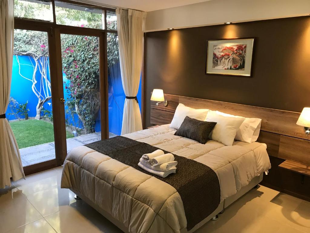 Cama ou camas em um quarto em Villa San José
