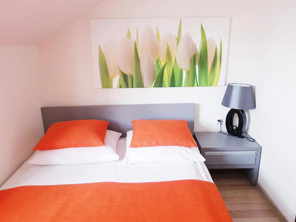 Postel nebo postele na pokoji v ubytování Hotel i Restauracja Pod Skałą Jasło