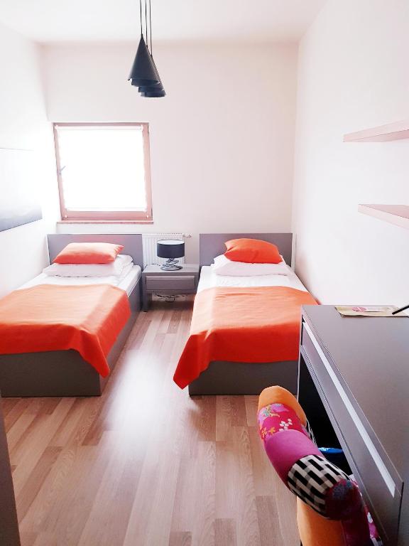 Postel nebo postele na pokoji v ubytování Hotel i Restauracja Pod Skałą Jasło