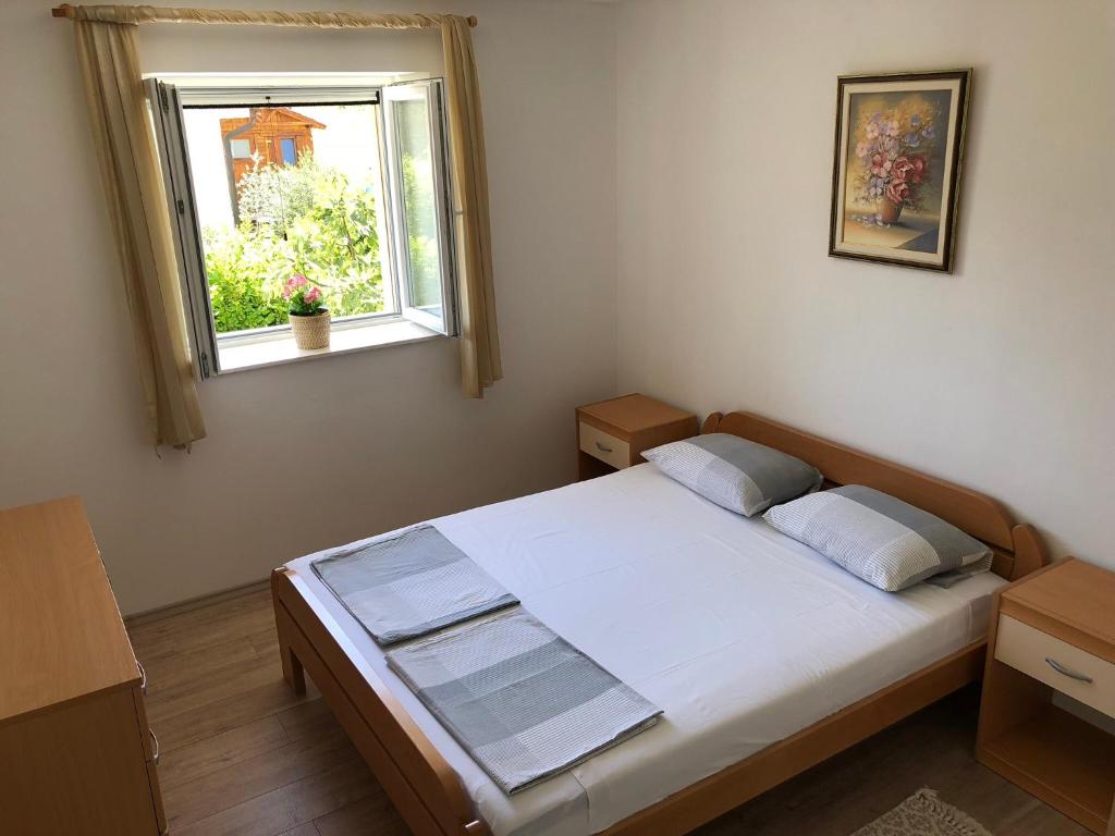 Voodi või voodid majutusasutuse Apartment Filipovic toas