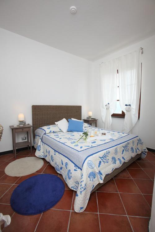 Postel nebo postele na pokoji v ubytování Rooms and Breakfast da Carla