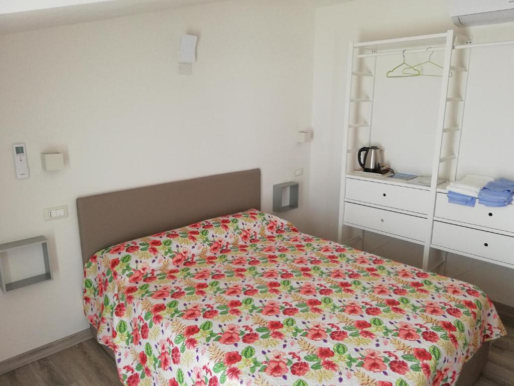 A bed or beds in a room at B&B MOLINARI