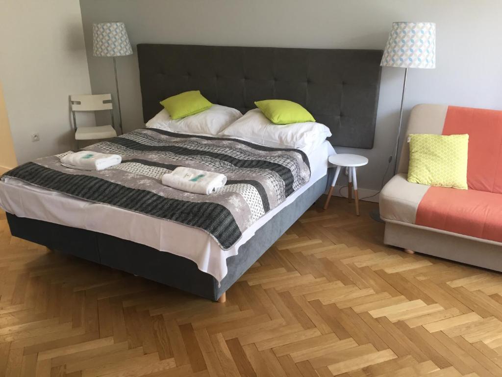 Vuode tai vuoteita majoituspaikassa Apartament Miro