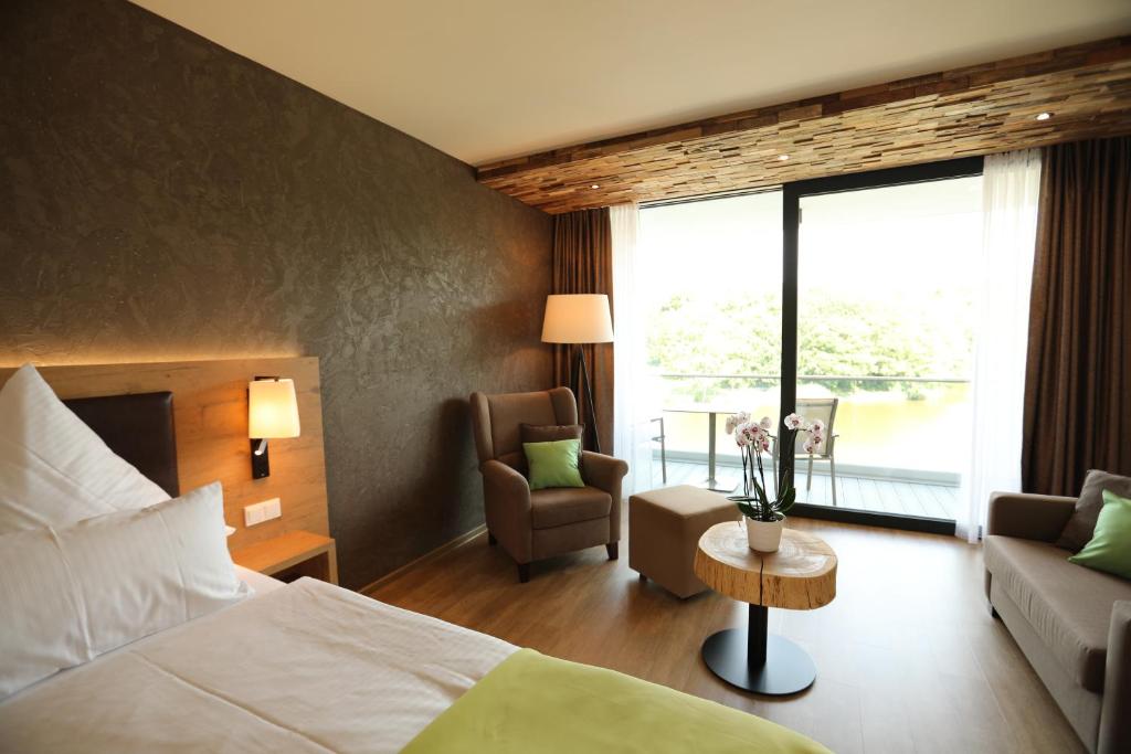 Postel nebo postele na pokoji v ubytování PETERS Hotel & Spa
