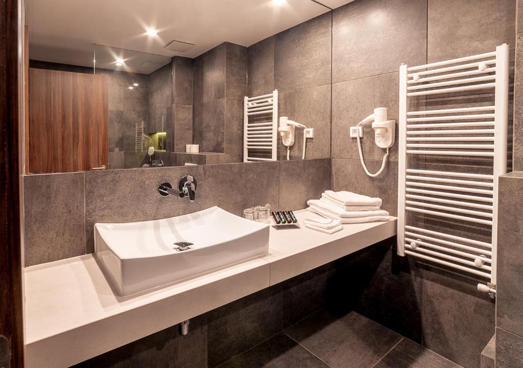 Kopalnica v nastanitvi Atelier Hotel
