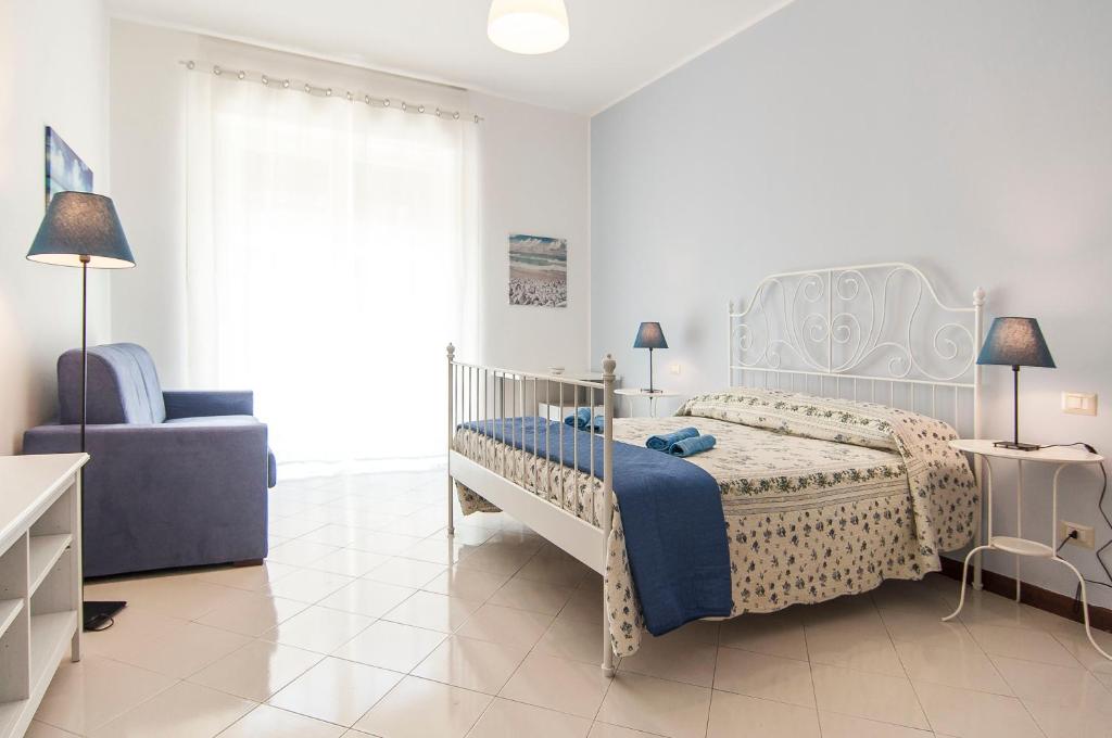 Postel nebo postele na pokoji v ubytování Casa di Nora