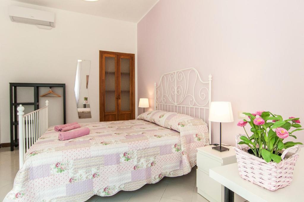 Postel nebo postele na pokoji v ubytování Casa di Nora