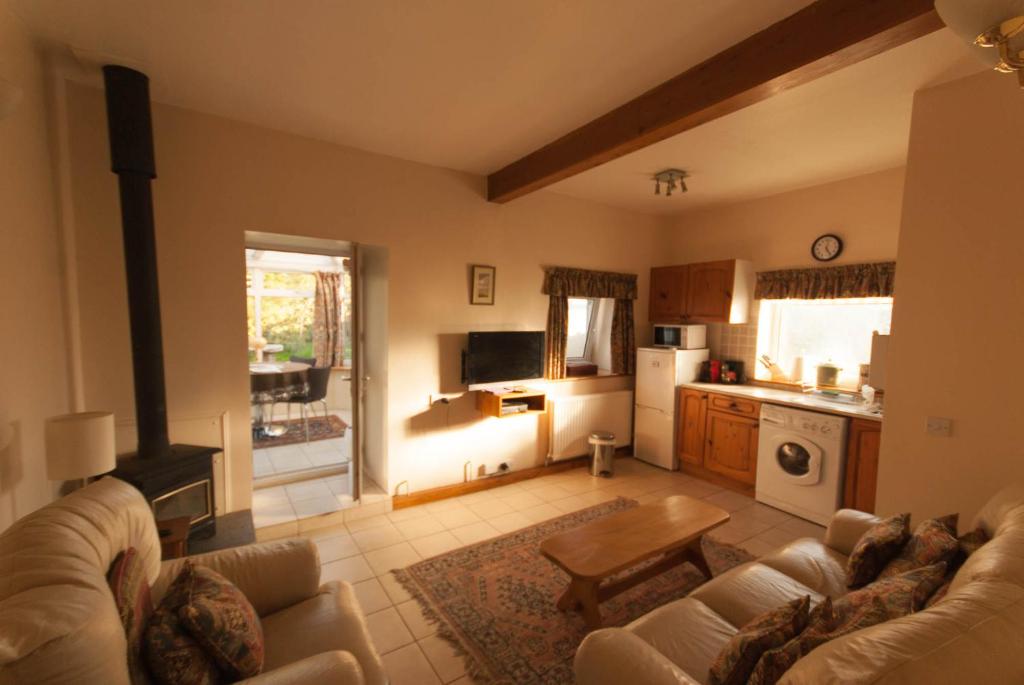 Posezení v ubytování Greyfield Farm Cottages