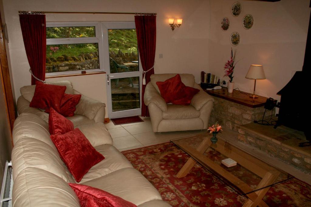 Posezení v ubytování Greyfield Farm Cottages