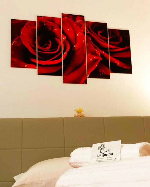 Postel nebo postele na pokoji v ubytování La Quercia