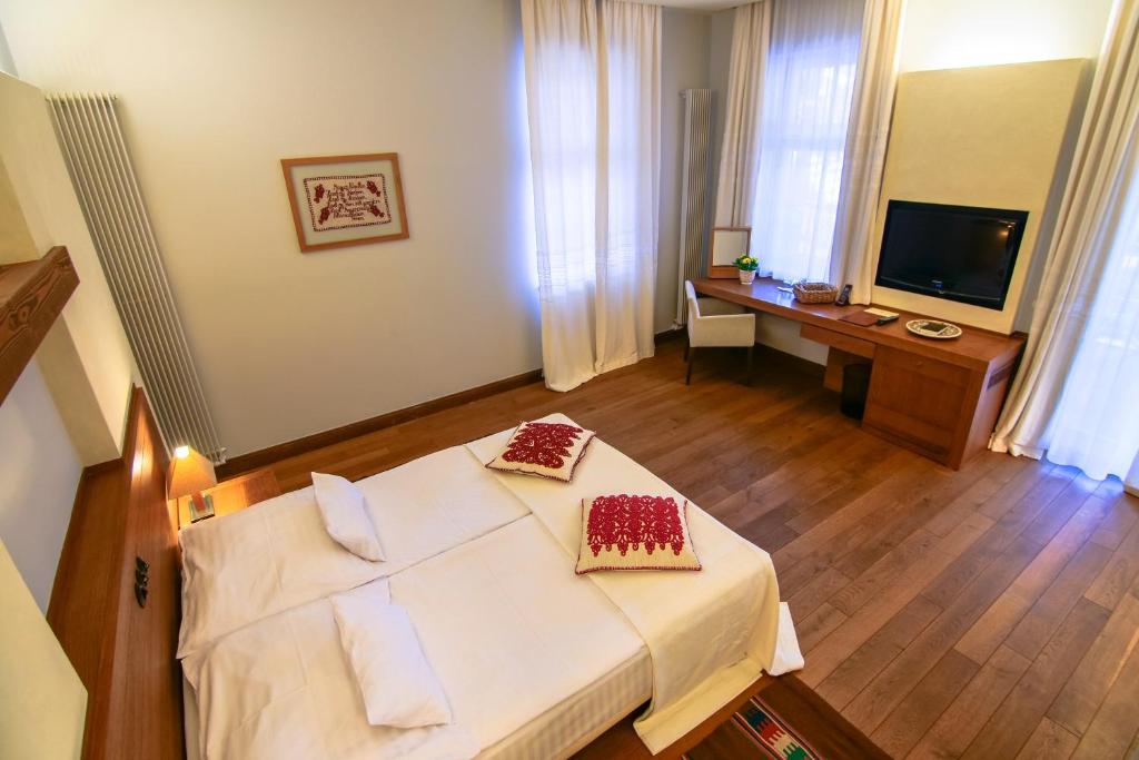 Postel nebo postele na pokoji v ubytování Hotel Pacsirta