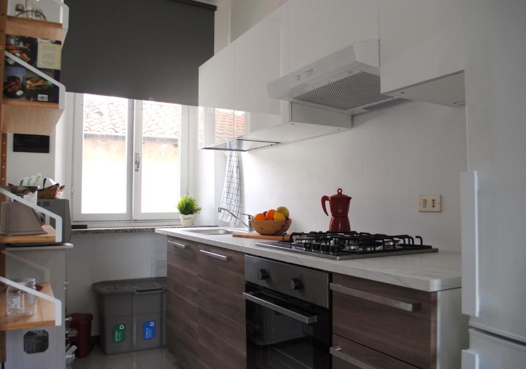 Kuchyň nebo kuchyňský kout v ubytování Bnbook Cascina Crennese