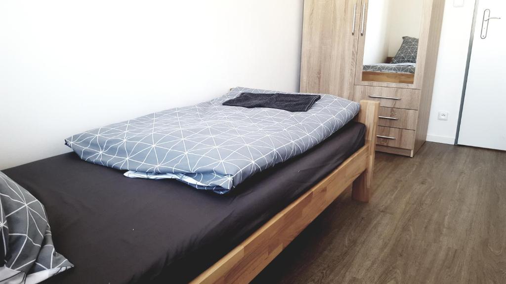Postel nebo postele na pokoji v ubytování Apartment MDK Sokolov