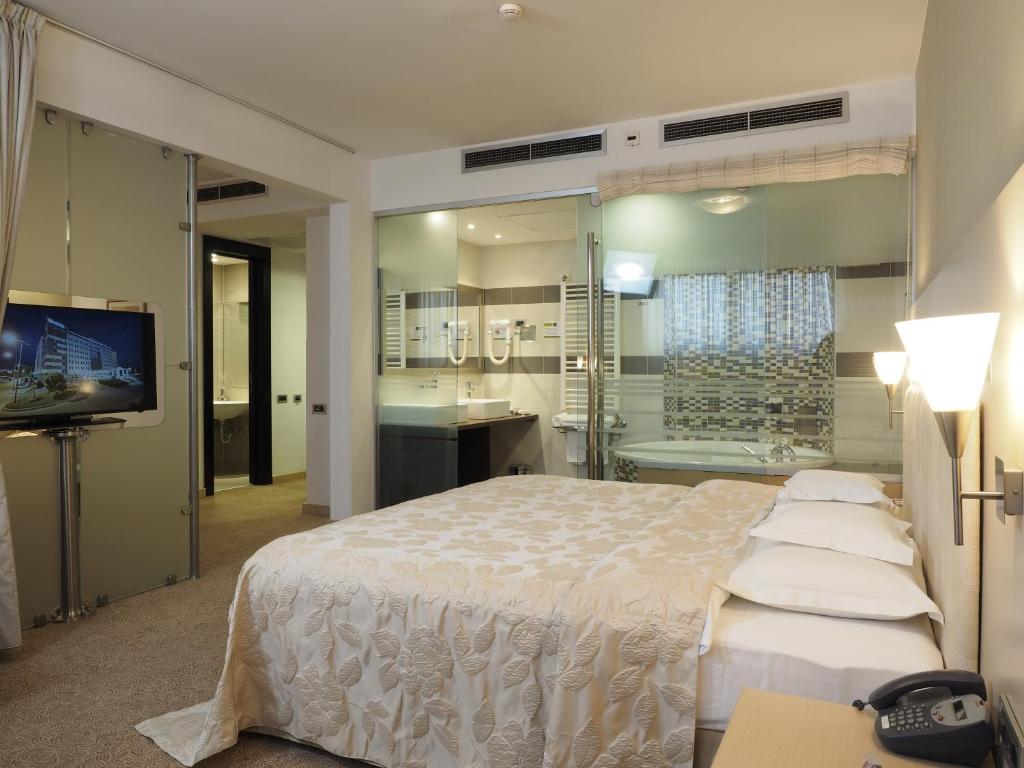 Krevet ili kreveti u jedinici u okviru objekta IN Hotel Beograd