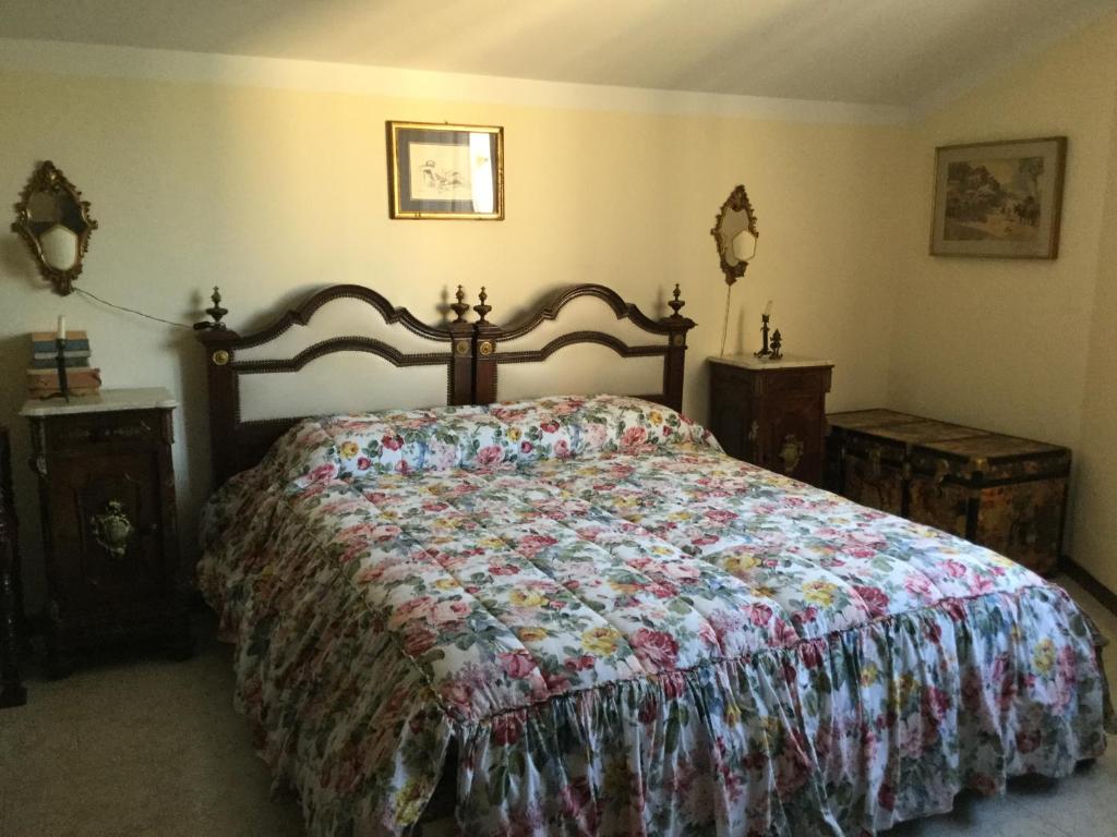 Ένα ή περισσότερα κρεβάτια σε δωμάτιο στο suite al Pian