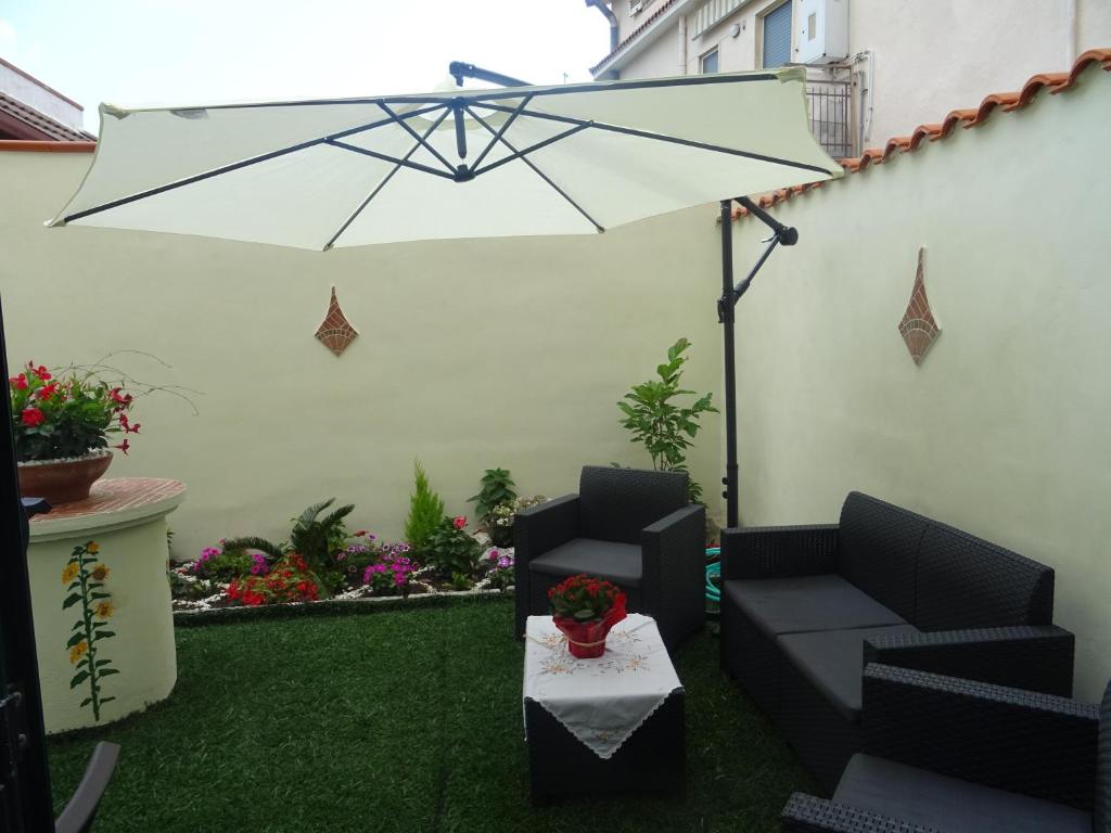 Posezení v ubytování B&B Alòs