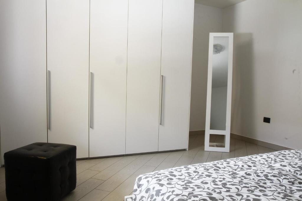 Łóżko lub łóżka w pokoju w obiekcie Adamello Brenta Sunshine