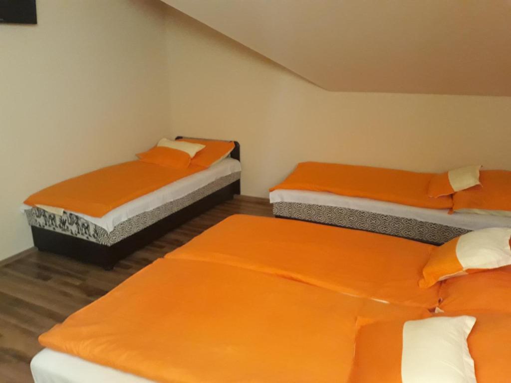 Postel nebo postele na pokoji v ubytování Rita Apartman