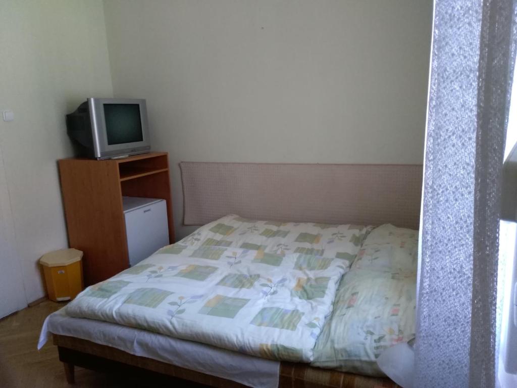 Postel nebo postele na pokoji v ubytování Siófokroom24