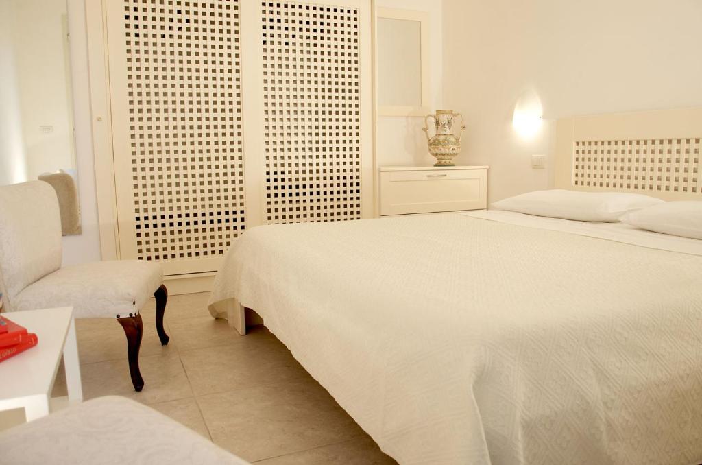 Posteľ alebo postele v izbe v ubytovaní Residence Castello Otranto
