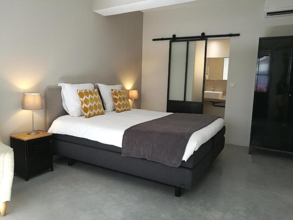 Voodi või voodid majutusasutuse L'Observance Bed & Breakfast toas