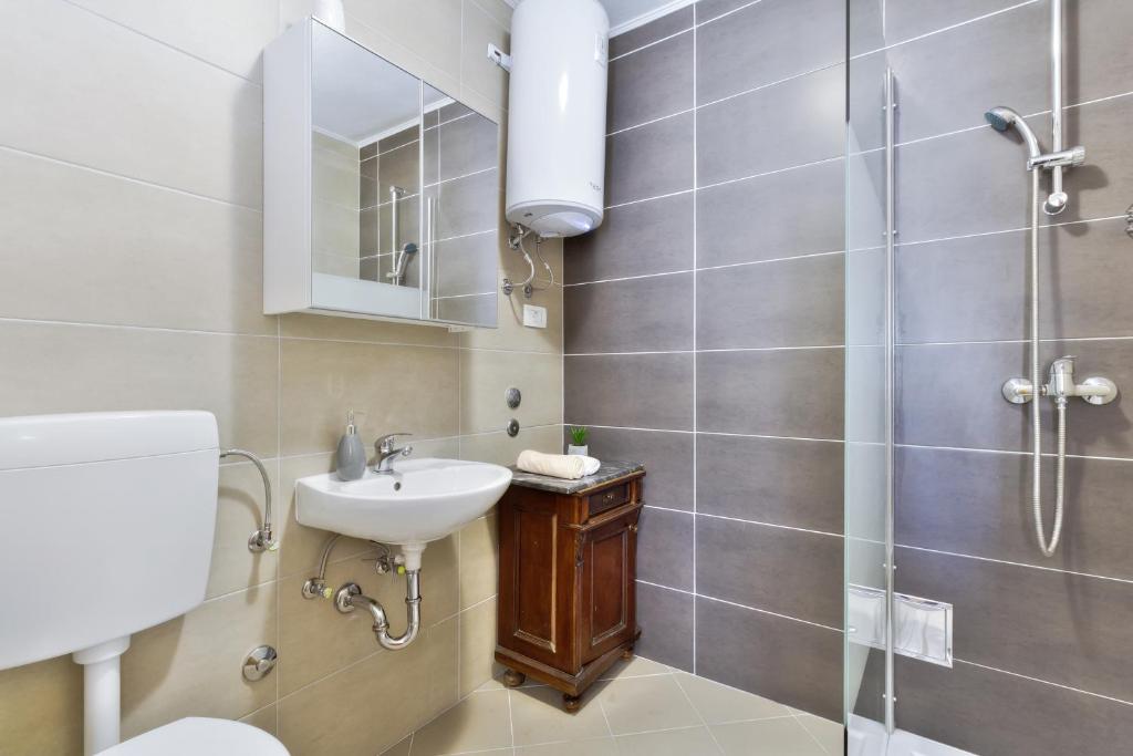Koupelna v ubytování Apartmani Anna