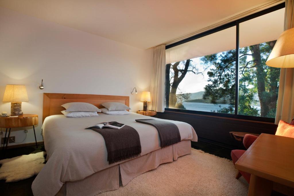 Uma cama ou camas num quarto em Hotel Antumalal