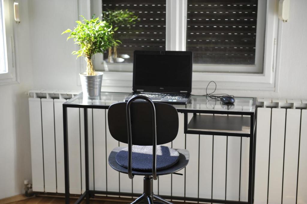 Televízia a/alebo spoločenská miestnosť v ubytovaní Apartment Rudy