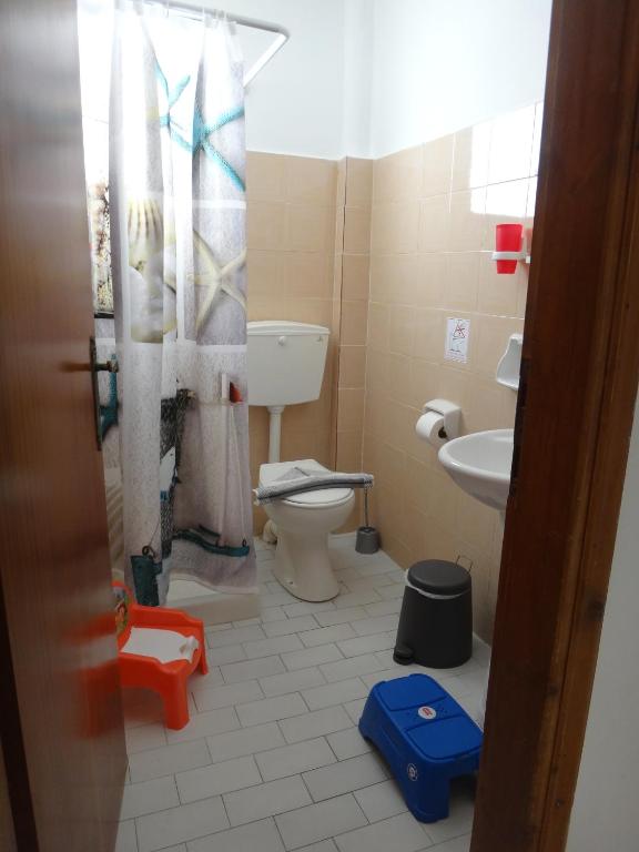Koupelna v ubytování Amfi Apartments