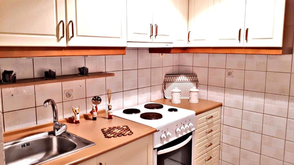 Kuchyň nebo kuchyňský kout v ubytování Cozy and minimal apartment