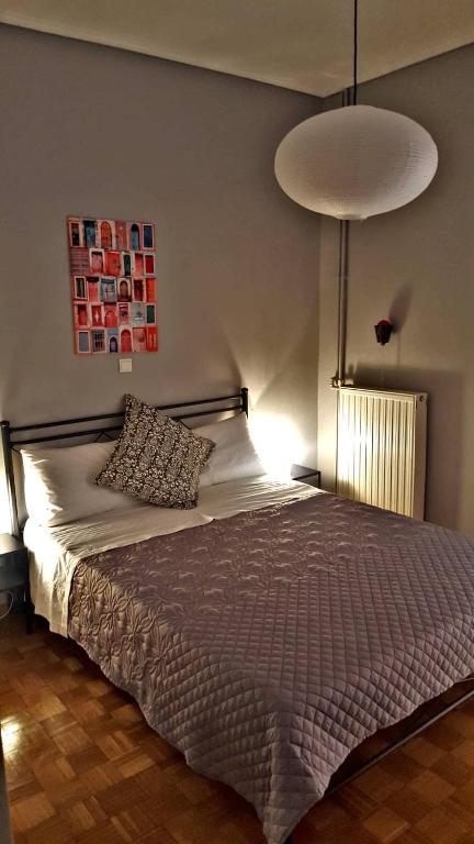 Postel nebo postele na pokoji v ubytování Cozy and minimal apartment