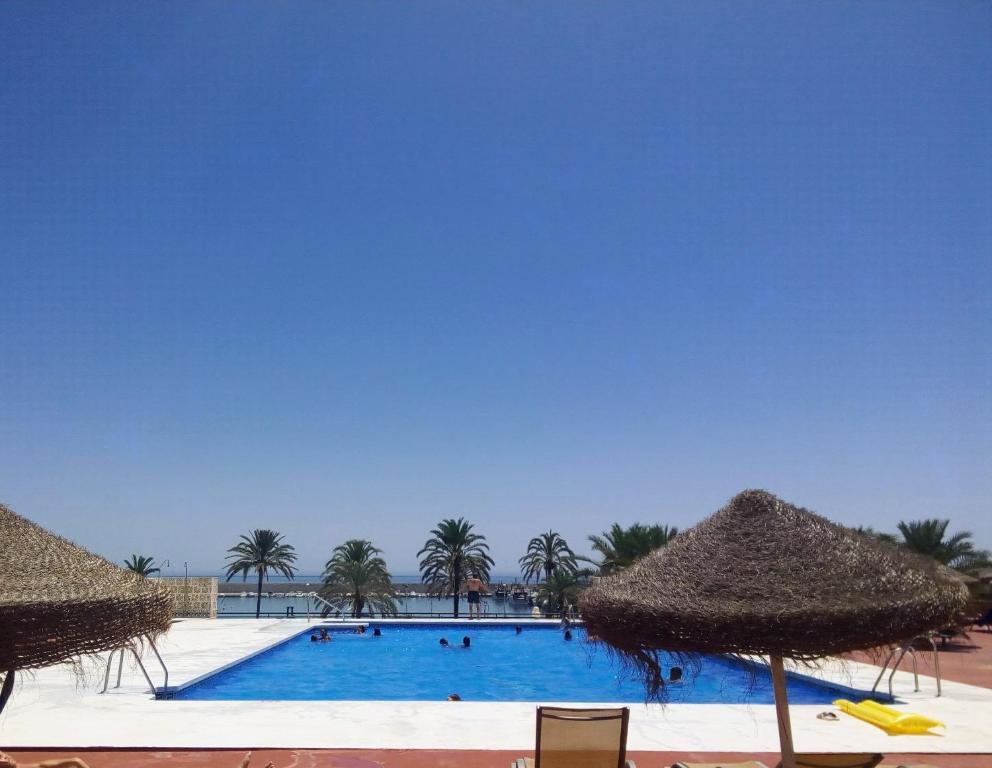 The swimming pool at or close to Recently refurbished apartment with sea views.