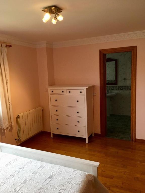Łóżko lub łóżka w pokoju w obiekcie Posada Adela