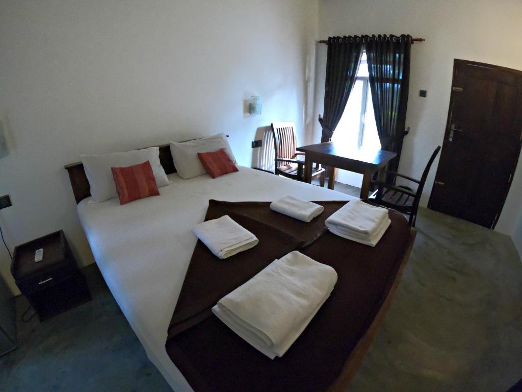 Postel nebo postele na pokoji v ubytování Luna Beach Hotel