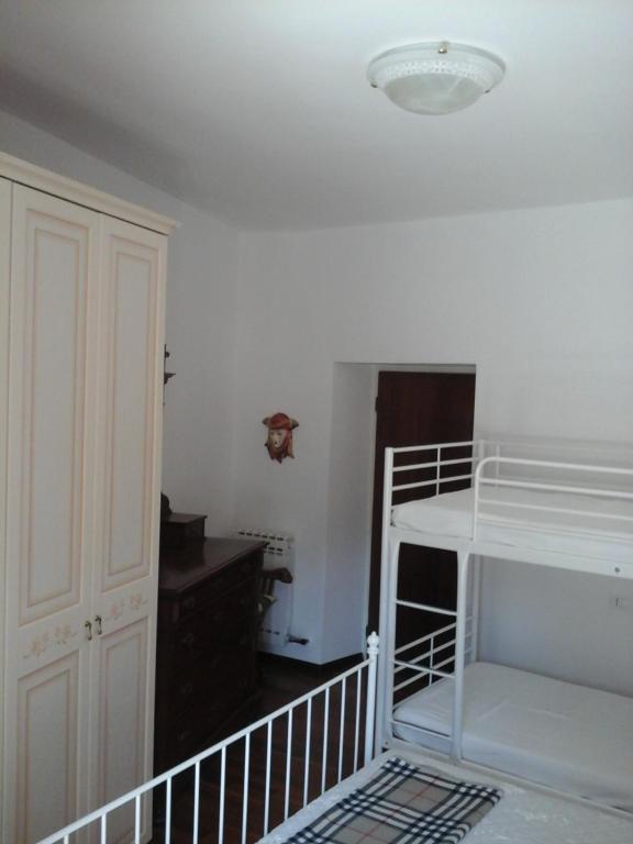 Postel nebo postele na pokoji v ubytování Casa Zia Adry