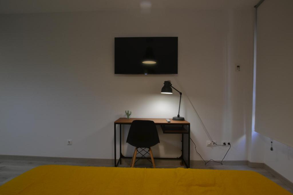 TV a/nebo společenská místnost v ubytování Loft Urban Casual
