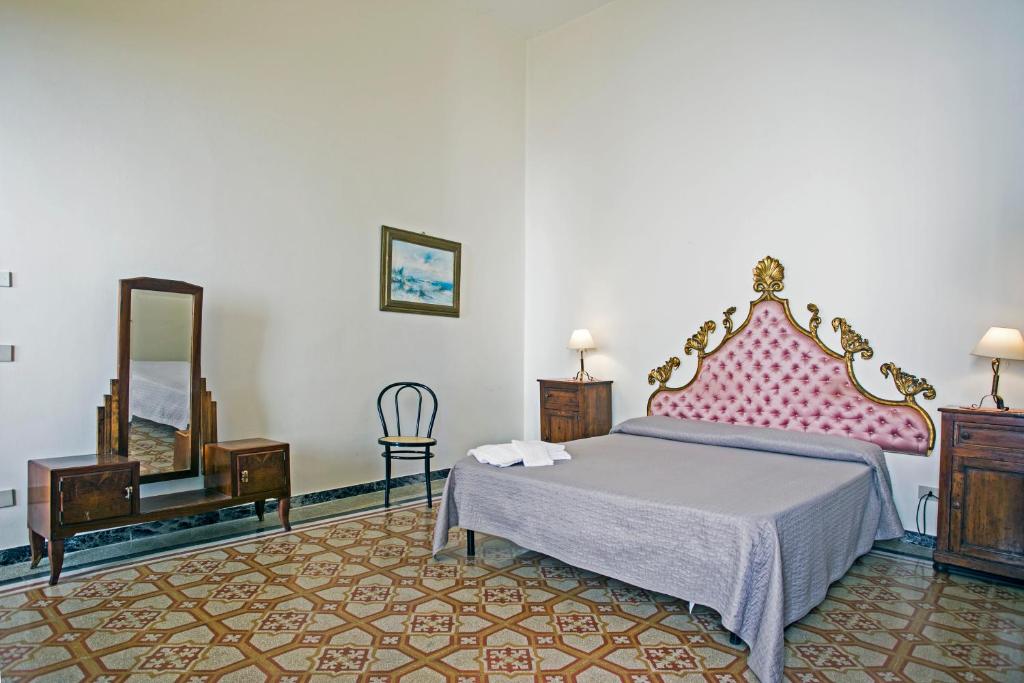 Letto o letti in una camera di Bed and Breakfast La Torretta
