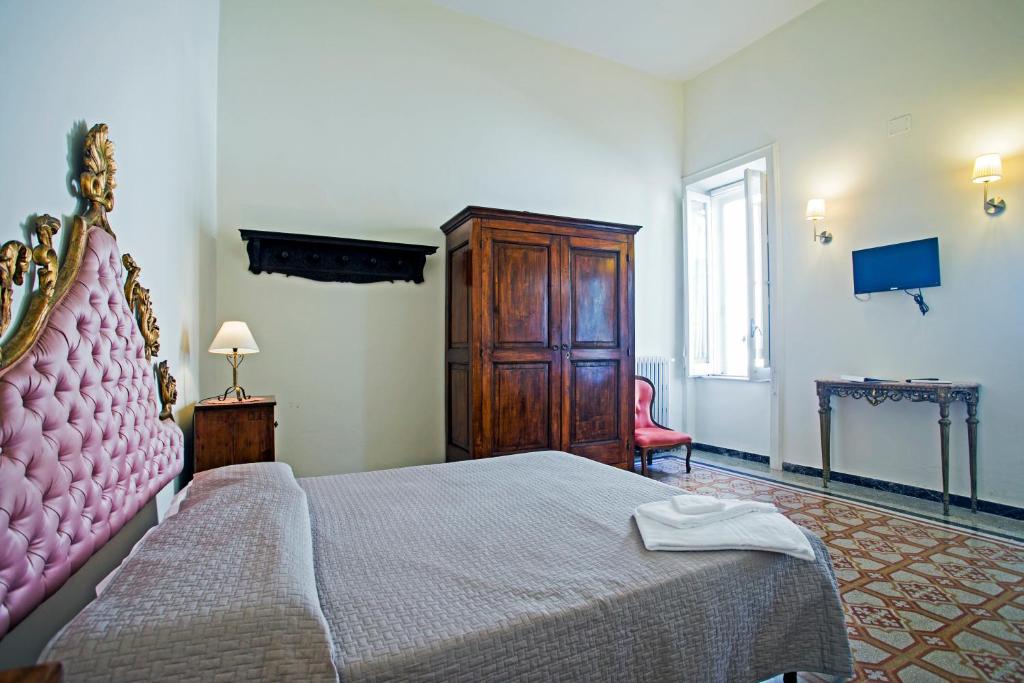 Letto o letti in una camera di Bed and Breakfast La Torretta
