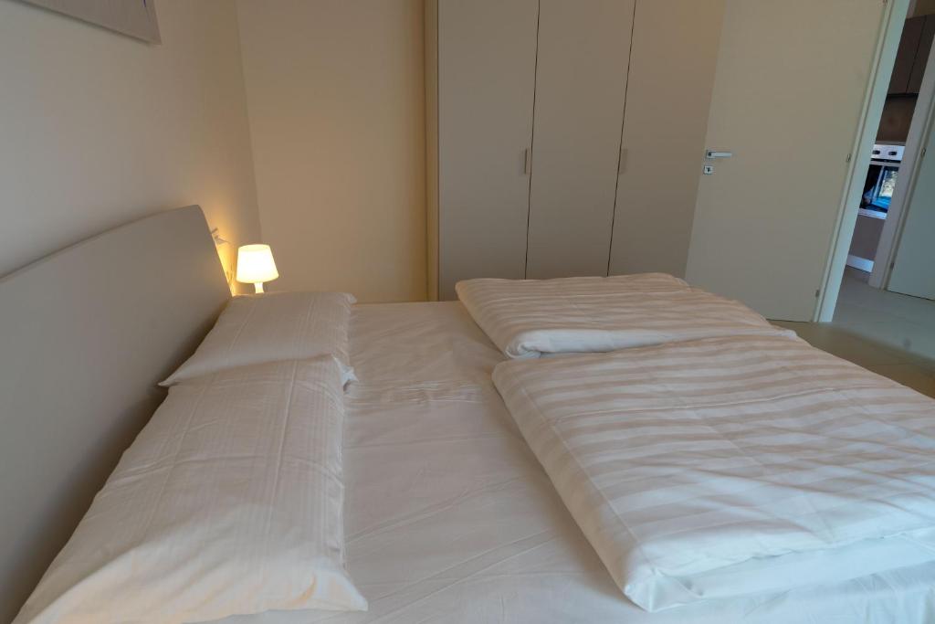 Posteľ alebo postele v izbe v ubytovaní Val Mora Bio Apartments