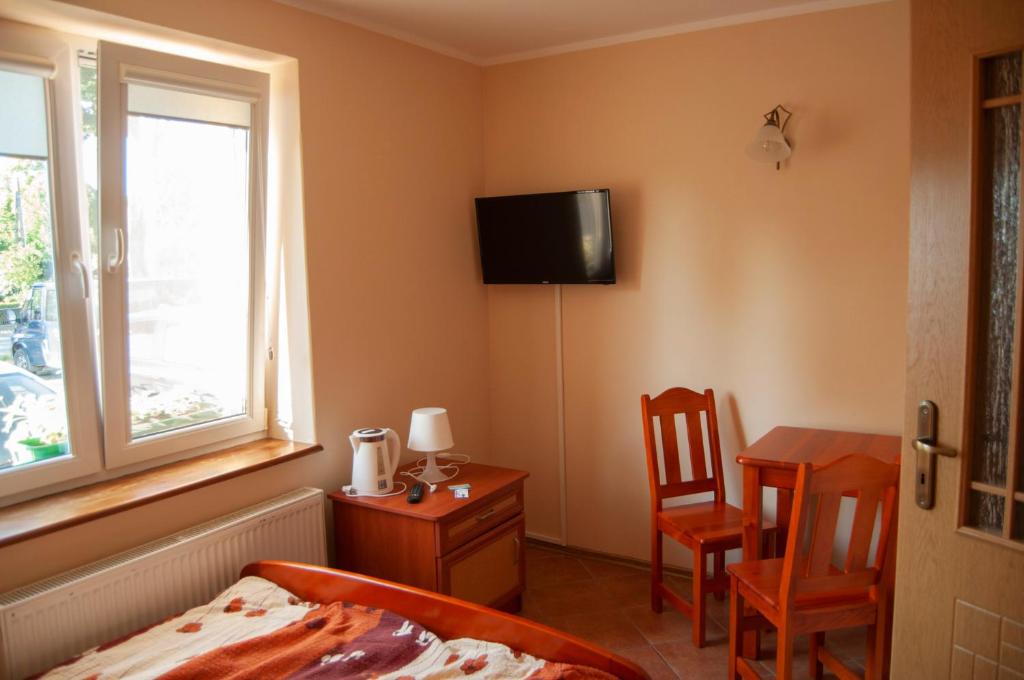 TV a/nebo společenská místnost v ubytování JANTAR Pokoje i Domki u Reni