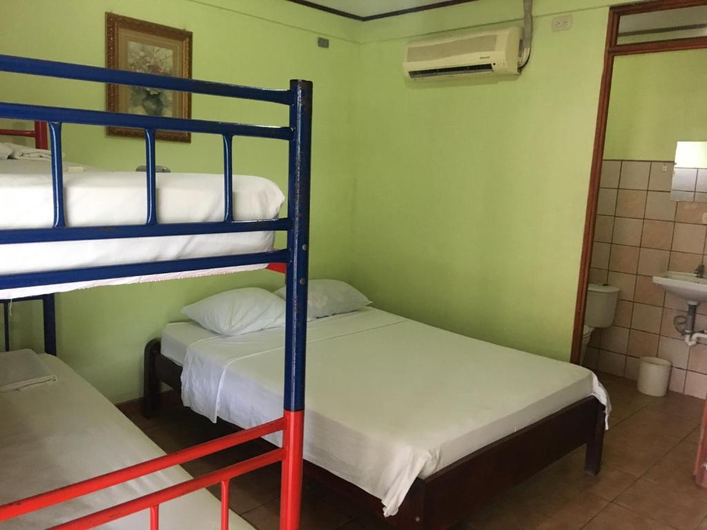 Postel nebo postele na pokoji v ubytování Cabinas Brisas del Golfo