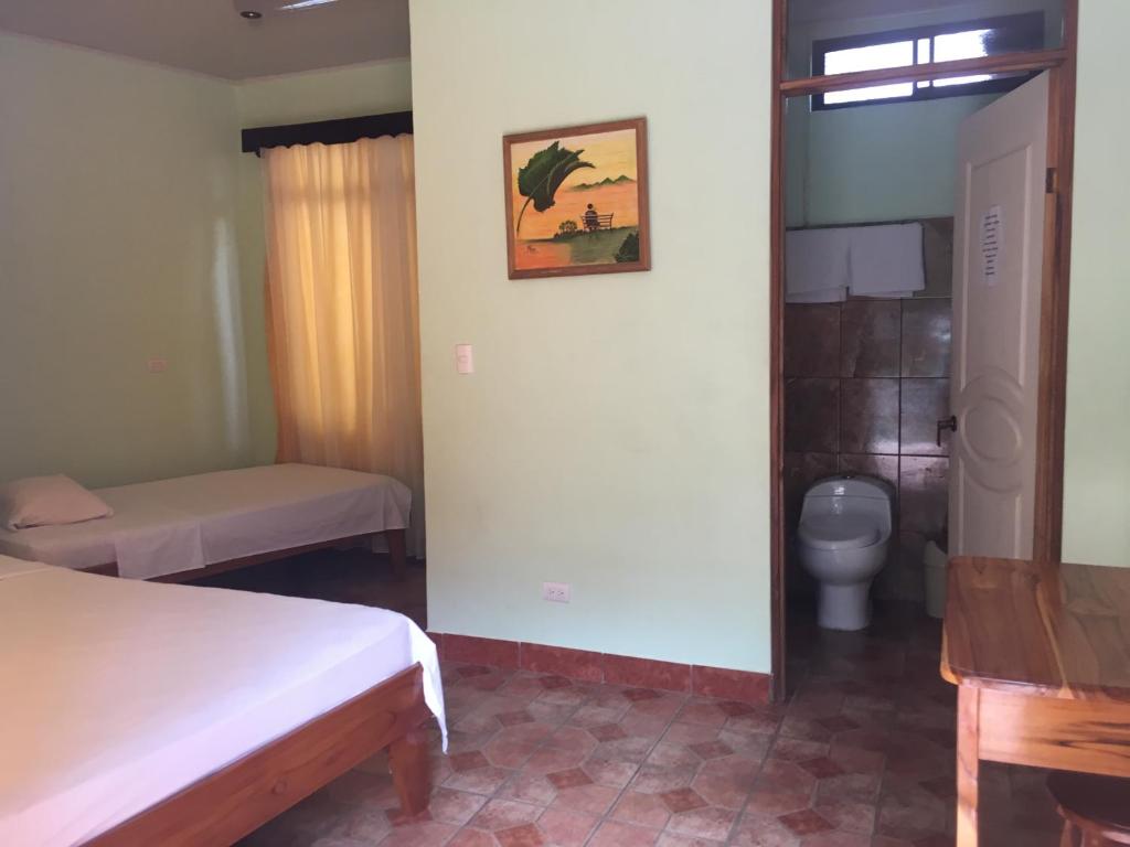 Postel nebo postele na pokoji v ubytování Cabinas Brisas del Golfo