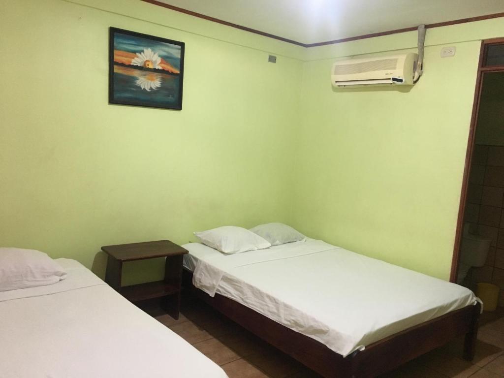 Postel nebo postele na pokoji v ubytování Cabinas Brisas del Golfo