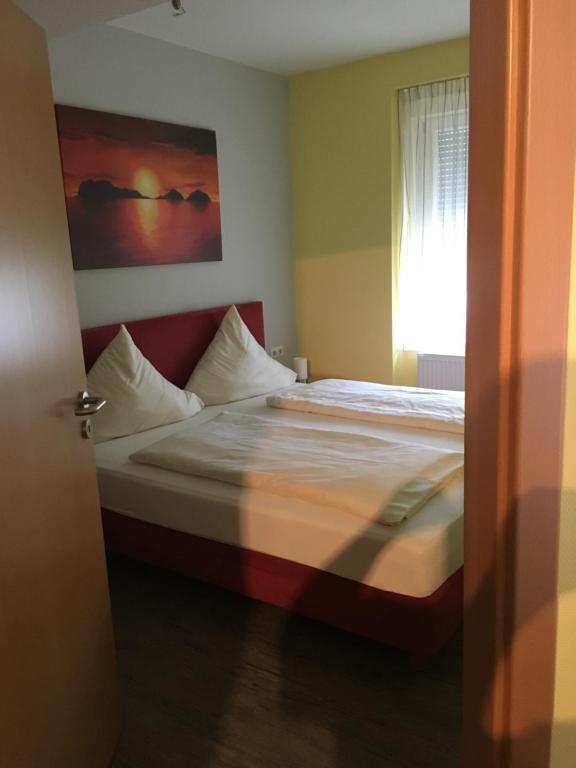 Postel nebo postele na pokoji v ubytování Gasthaus Schützen